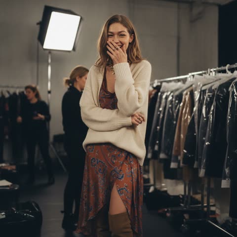 Gigi Hadid backstage before the show